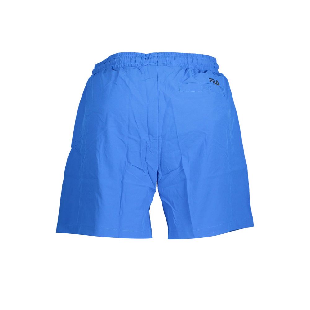 Fila Blue Polyester Swimwear beach boxer with elastic waistband, 2 side pockets and 1 back pocket, logo print, perfect for the beach.