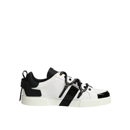 Dolce & Gabbana White Leather Logo Portofino Sneakers Shoes with black accents and lace-up closure on a rubber sole.