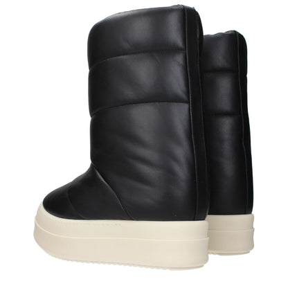 Rick Owens Black Leather Ankle Boots with black leather design and white sole, showcasing sleek style and designer craftsmanship.