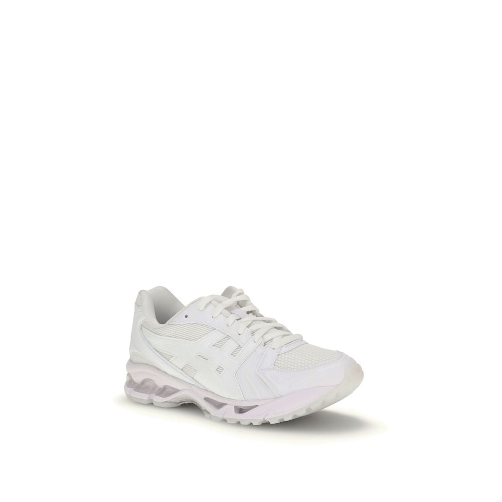 Comme Des Garçons White Polyamide Athletic Sneakers with minimal lace-up design and durable rubber sole, perfect for versatile wear.