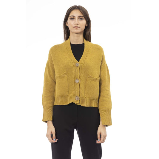 Alpha Studio Yellow Merino Wool Women Cardigan with button closure and pockets, worn by model.