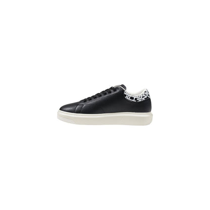 Armani Exchange Black And White Leather Low Top Sneakers with logo detail and sturdy sole, side view.