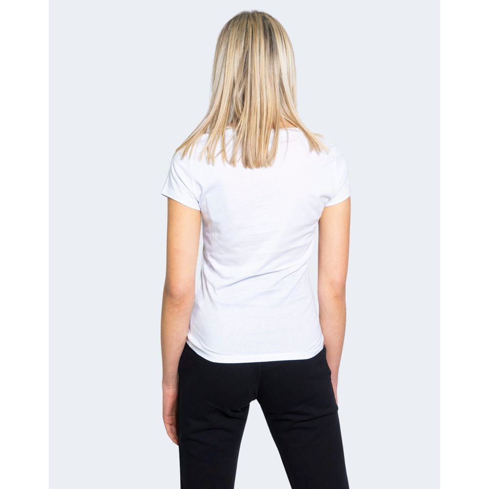 Woman wearing Armani Exchange White Cotton T-Shirt, rear view, showcasing short sleeves and simple elegance.