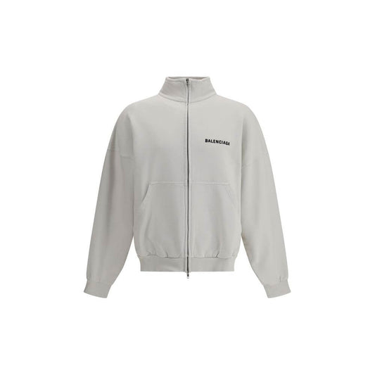 Balenciaga White Cotton Sweatshirt with logo and two patch pockets, a blend of contemporary design and classic style.