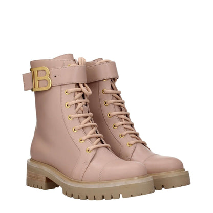 Balmain Beige Leather Ankle Boots with side logo, lace-up closure, mid heels, and round toe, featuring a sporty glam design.
