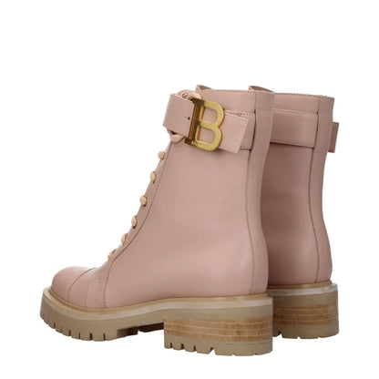 Balmain Beige Leather Ankle Boots with gold side logo and lace-up closure, featuring a 4.5 cm mid heel and round toe, sporty glam style.