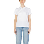 Woman wearing Blauer White Polyester T-Shirt with classic collar and button closure, showcasing modern comfort and essential style.