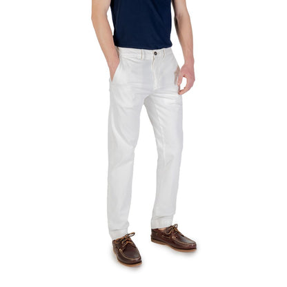 Man wearing Borghese White Cotton Skinny Pants with casual shoes and black t-shirt