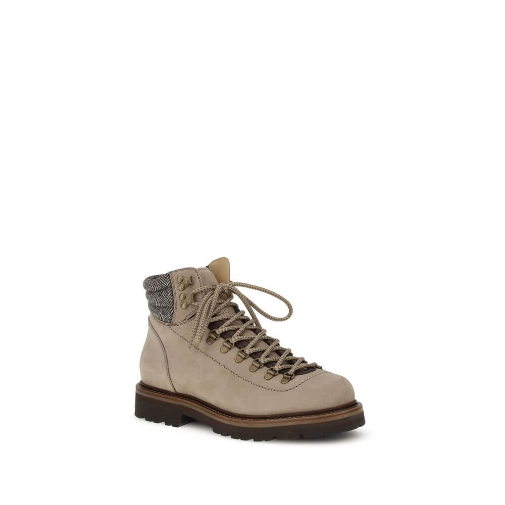 Brunello Cucinelli Beige Calf Leather Bos Taurus Lace-Up Boots with metal eyelets and two-tone laces for a sporty look.