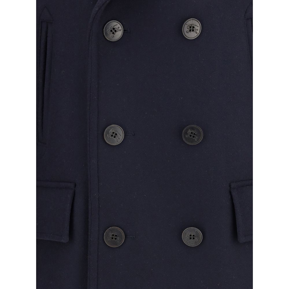 Close-up of Burberry Blue Wool Coat with double-breasted design and debossed buttons.