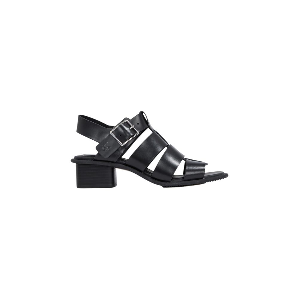 Side view of Calvin Klein Jeans Black Polyester Flat Sandals with square toe and buckle closure, showcasing elegant interlaced straps.