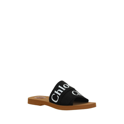 Chloé Black Rubber Sandals with branded insole, square toe, flat sole, and double fabric band featuring contrasting iconic brand signature.