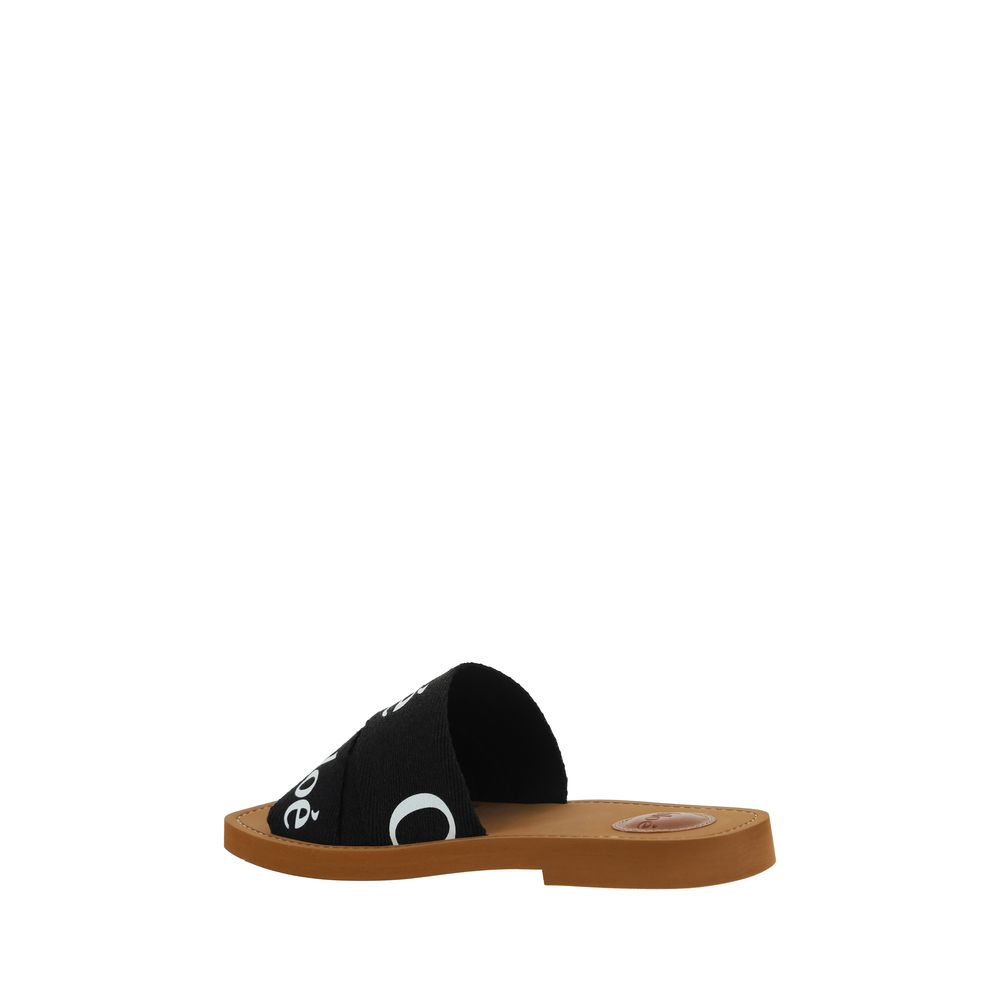 Chloé Black Rubber Sandals with square toe and flat sole, featuring double front fabric band with brand signature for SS26.