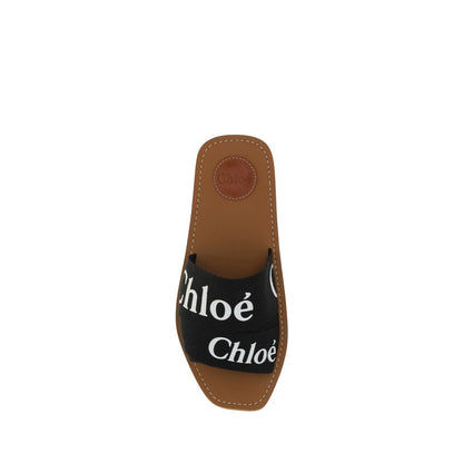Top view of Chloé Black Rubber Sandals featuring branded insole and double front fabric band with logo.