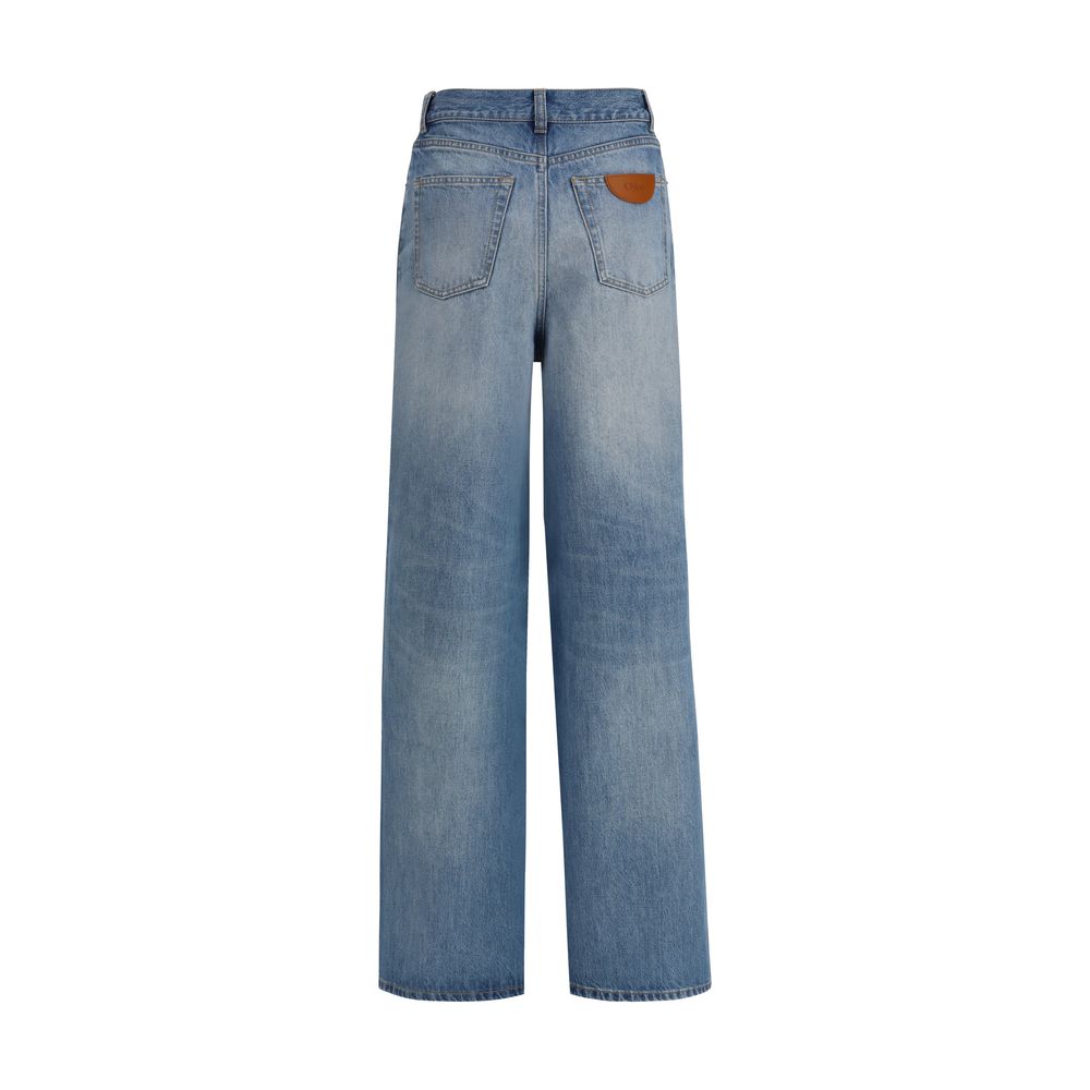 Back view of Chloé Blue Cotton Jeans Denim featuring wide-leg and high-rise design with leather logo label.