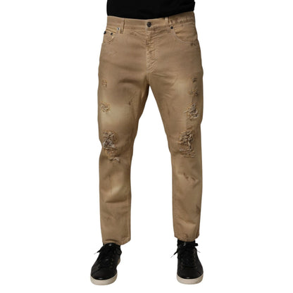 Dolce & Gabbana Beige Cotton Loose Tattered Men Denim Jeans with distressed detailing, ideal for a casual, modern look.
