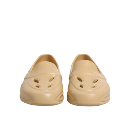 Dolce & Gabbana Beige Rubber Slides Low Top Sneakers Shoes featuring a sleek modern design, crafted from durable beige rubber.