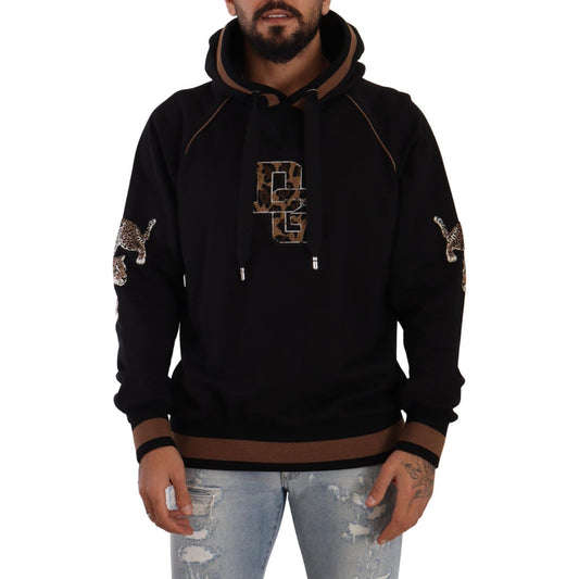 Man wearing Dolce & Gabbana Black Brown Leopard Cotton Hooded Pullover Sweater with logo details.