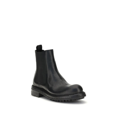 Dolce & Gabbana Black Calf Leather Bos Taurus Chelsea Boots with a sleek and elegant design.