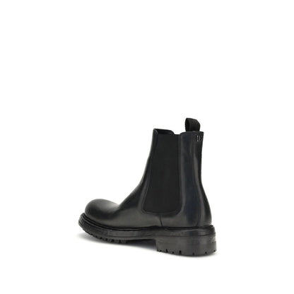 Dolce & Gabbana Black Calf Leather Bos Taurus Chelsea Boots showcasing side view with Bernini base and TPU leather sole.