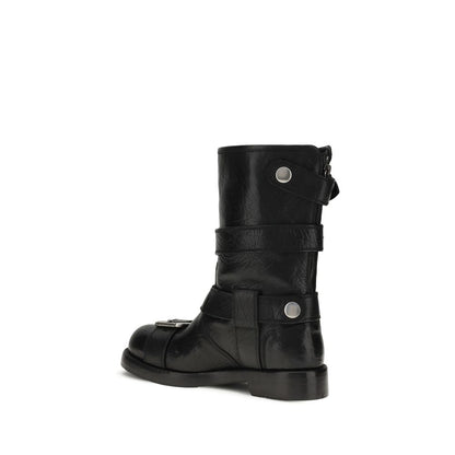 Dolce & Gabbana Black Calf Leather Bos Taurus Lace-Up Boots side view with buckled design and branded leather heel.