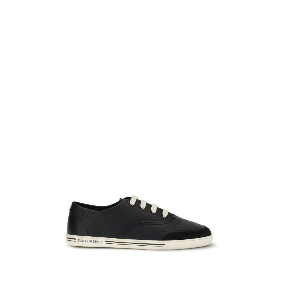 Dolce & Gabbana Black Calf Leather Bos Taurus Low Top Sneakers with durable TPU sole, perfect for contemporary style and comfort.