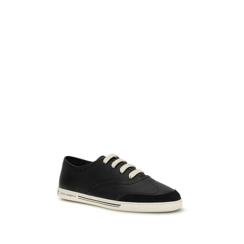 Dolce & Gabbana Black Calf Leather Bos Taurus Low Top Sneakers with TPU sole and custom label detail.