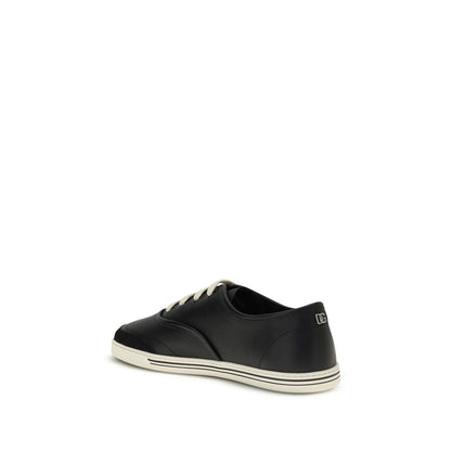 Dolce & Gabbana Black Calf Leather Bos Taurus Low Top Sneakers with TPU sole, featuring minimalist design, rear angle view.