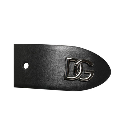 Dolce & Gabbana Black Calf Leather Studded Silver Buckle Belt with DG logo and sleek design, showing luxury craftsmanship made in Italy.