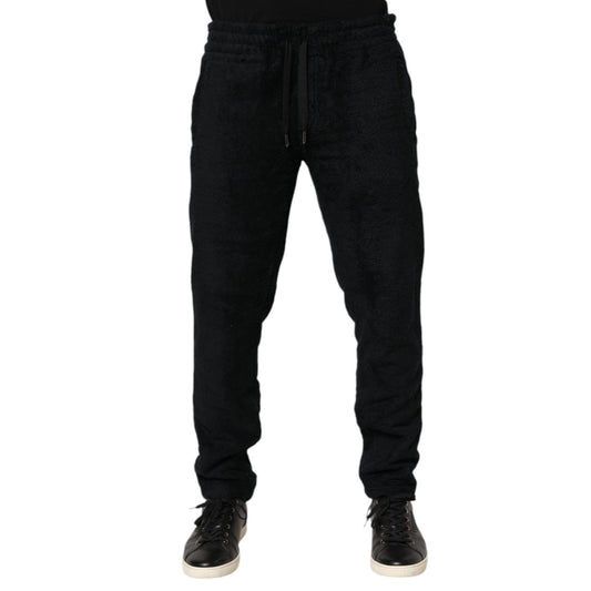 Dolce & Gabbana Black Cotton Logo Men Jogger Sweatpants Pants with tapered fit and adjustable waistband for comfort and style.
