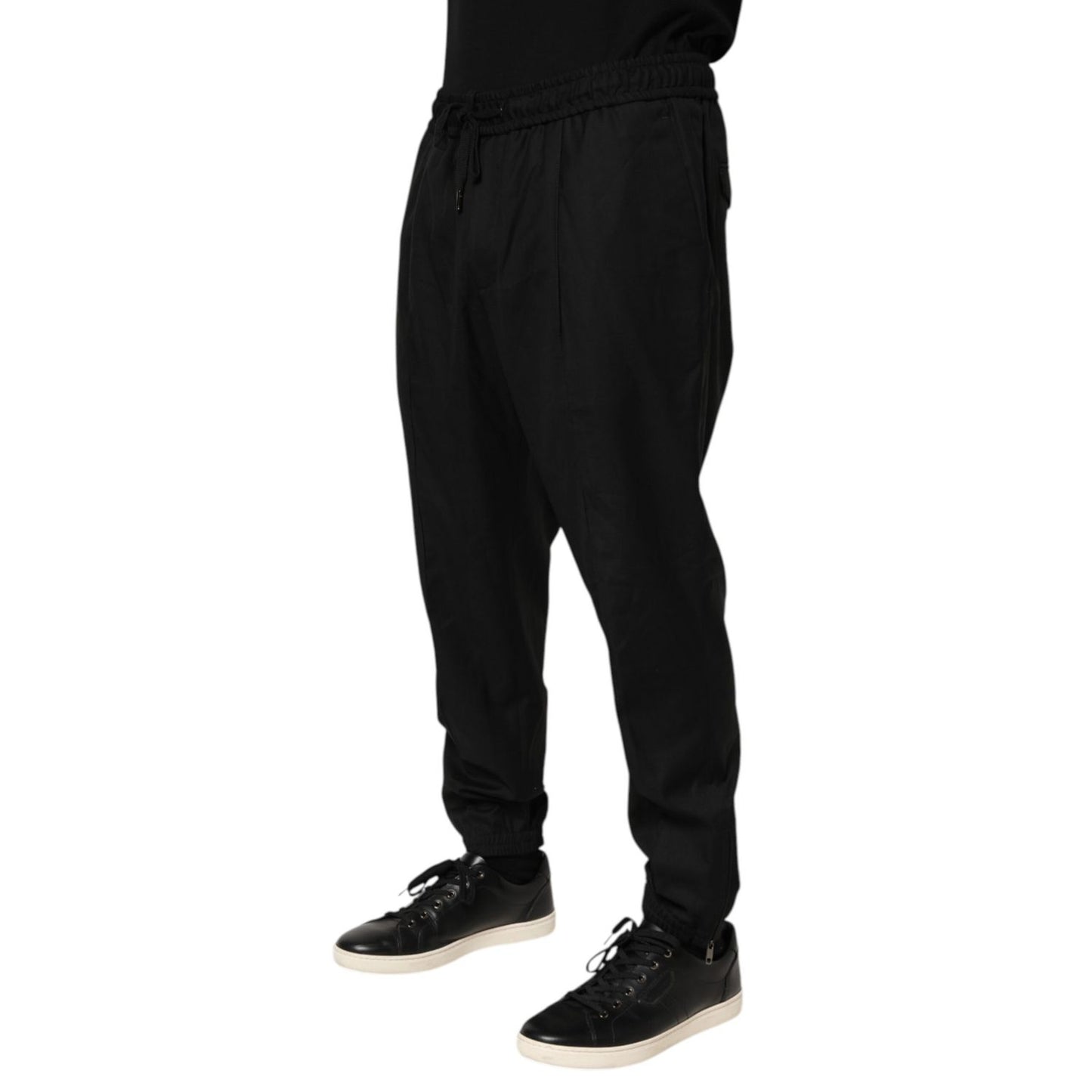 Dolce & Gabbana Black Drawstring Men Jogger Sweatpants Pants with side pockets and ribbed cuffs, perfect for casual or streetwear style.