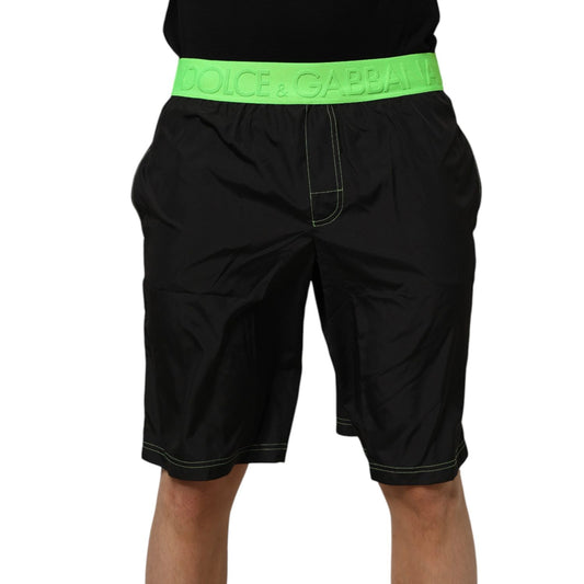 Dolce & Gabbana Black Green Logo Waistband Beachwear Short Swimwear with neon green waistband and black body.