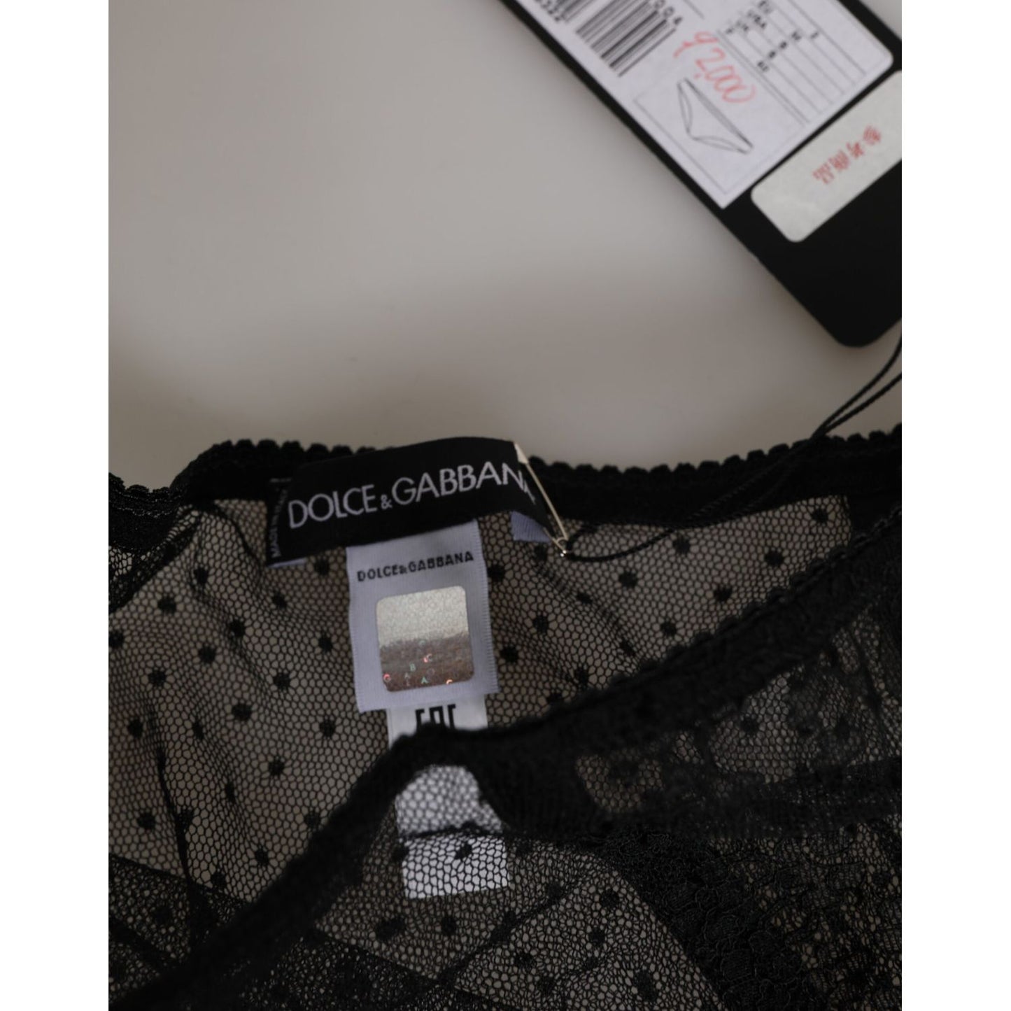 Dolce & Gabbana Black Lace Polka Dot Mesh High Waist Underwear close-up with logo detailing and elegant design elements.