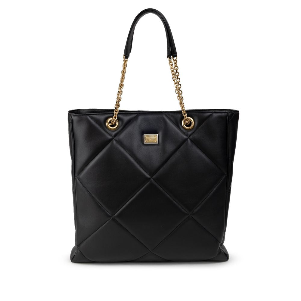 Dolce & Gabbana Black Leather Matelassé Tote Bag with gold chains, snap closure, and logo tag on front.