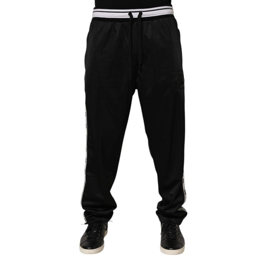 Dolce & Gabbana Black Polyester Logo Stripe Track Jogger Pants with drawstring waist and white logo stripes for stylish athleisure wear.
