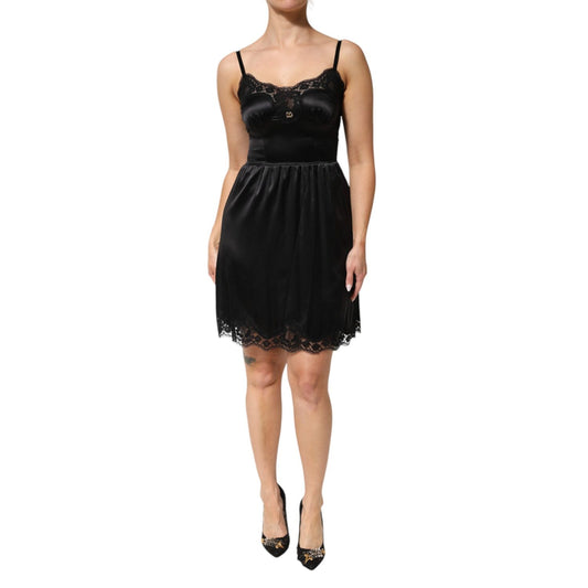 Dolce & Gabbana Black Silk Blend Lace Trim Sleeveless Mini Dress with adjustable straps and lace details, perfect for evening wear.