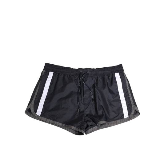 Dolce & Gabbana Black White Polyester Logo Elastic Waistband Swimwear with bold white side stripes.