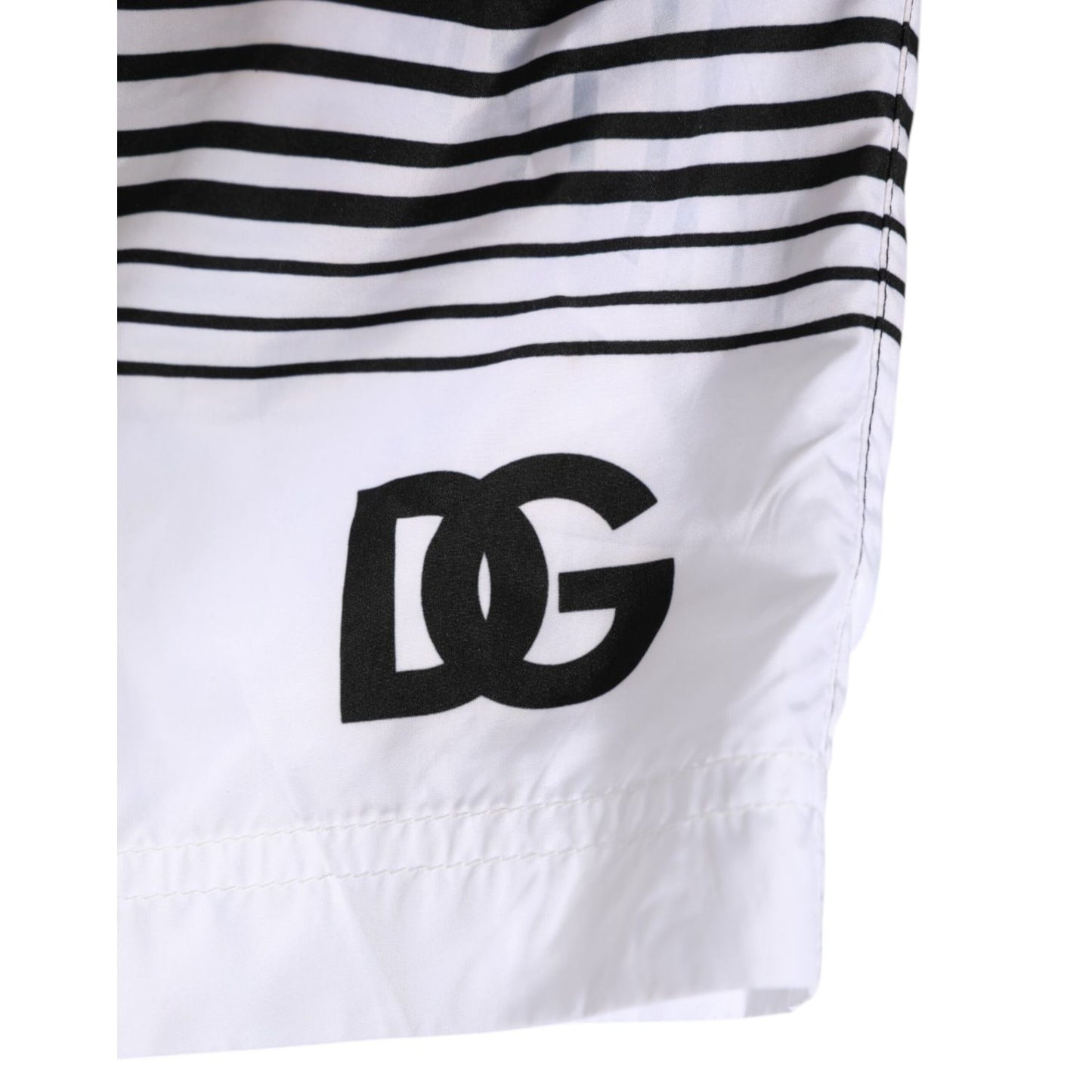 Dolce & Gabbana Black White Striped DG Logo Men Short Swimwear with bold DG logo detail on black and white striped design.