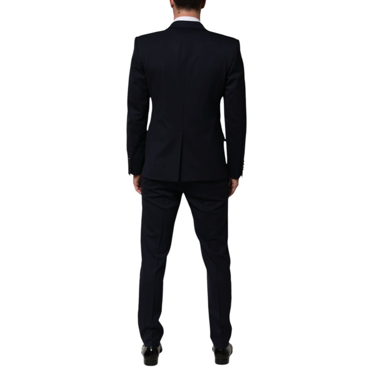 Back view of Dolce & Gabbana Black Wool 3 Piece Slim Fit Formal Men Suit showcasing tailored design and satin detailing.