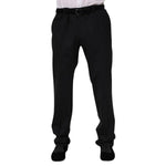 Dolce & Gabbana Black Wool Formal Dress Men Trousers Pants made of 97% virgin wool and 3% elastane with zipper closure, logo details.