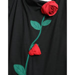 Close up of Dolce & Gabbana Black Wool Sleeveless Rose Applique Dress with red 3D rose embroidery detail.