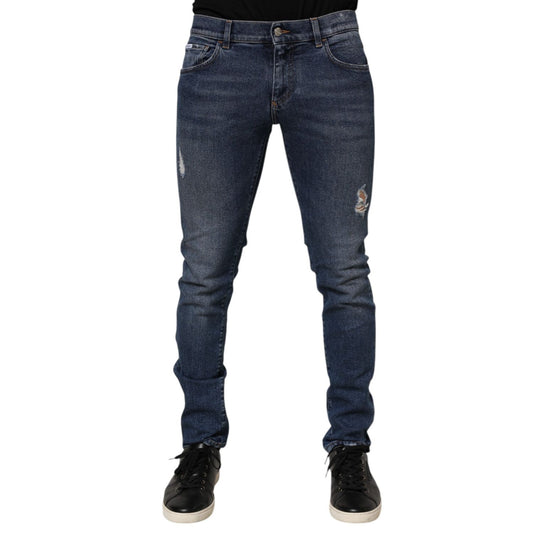 Dolce & Gabbana Blue Cotton Logo Plaque Skinny Men Denim Jeans with distressed detailing and classic five-pocket design.
