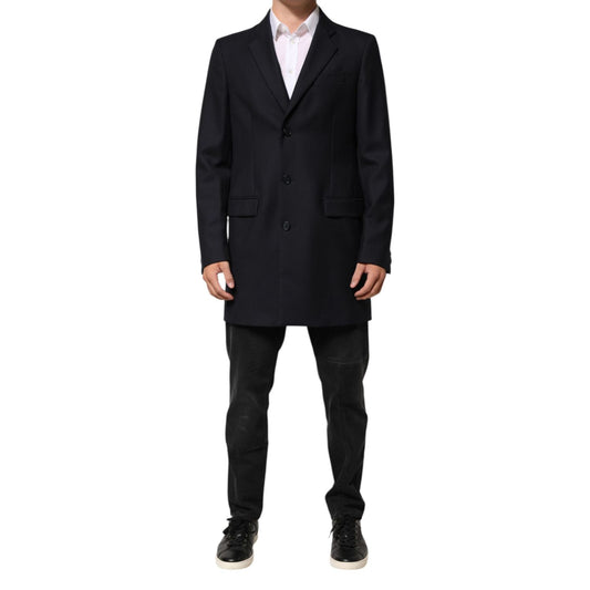 Dolce & Gabbana Dark Blue Wool Men Jacket Coat Blazer Suit with three-button closure and notch lapel, modeled with black pants.