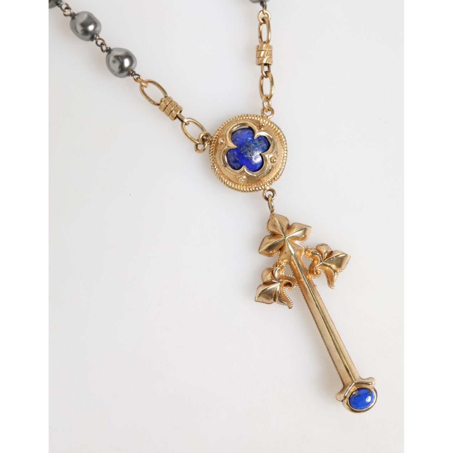 Dolce & Gabbana Gold Tone Beaded Chain Religious Cross Necklace with blue gemstone, sterling silver, and lobster closure.