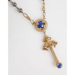 Dolce & Gabbana Gold Tone Beaded Chain Religious Cross Necklace with blue gemstone, sterling silver, and lobster closure.