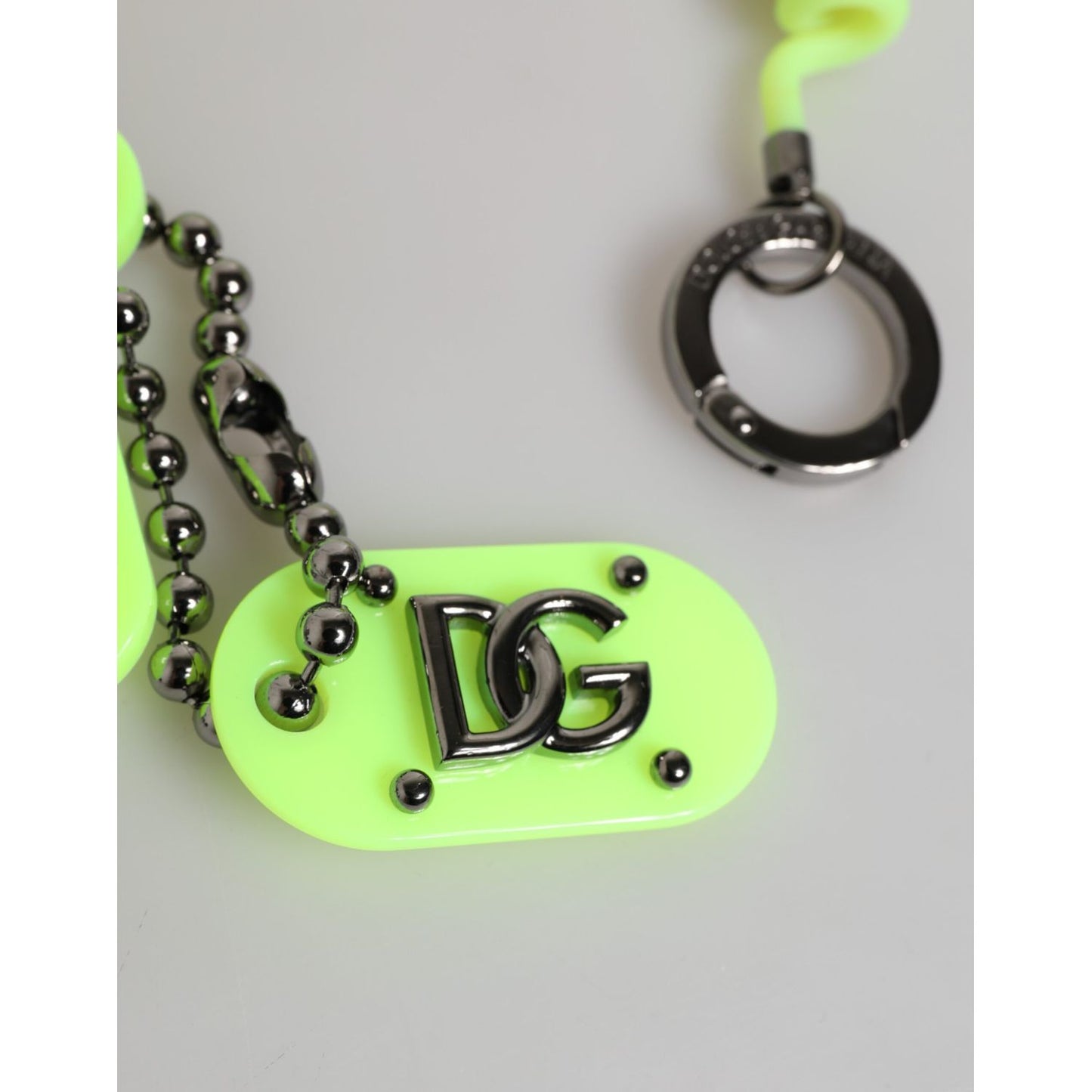 Dolce & Gabbana Green Springy Key Holder DG Logo Men's Keychain with vibrant green cord and metal DG charm.