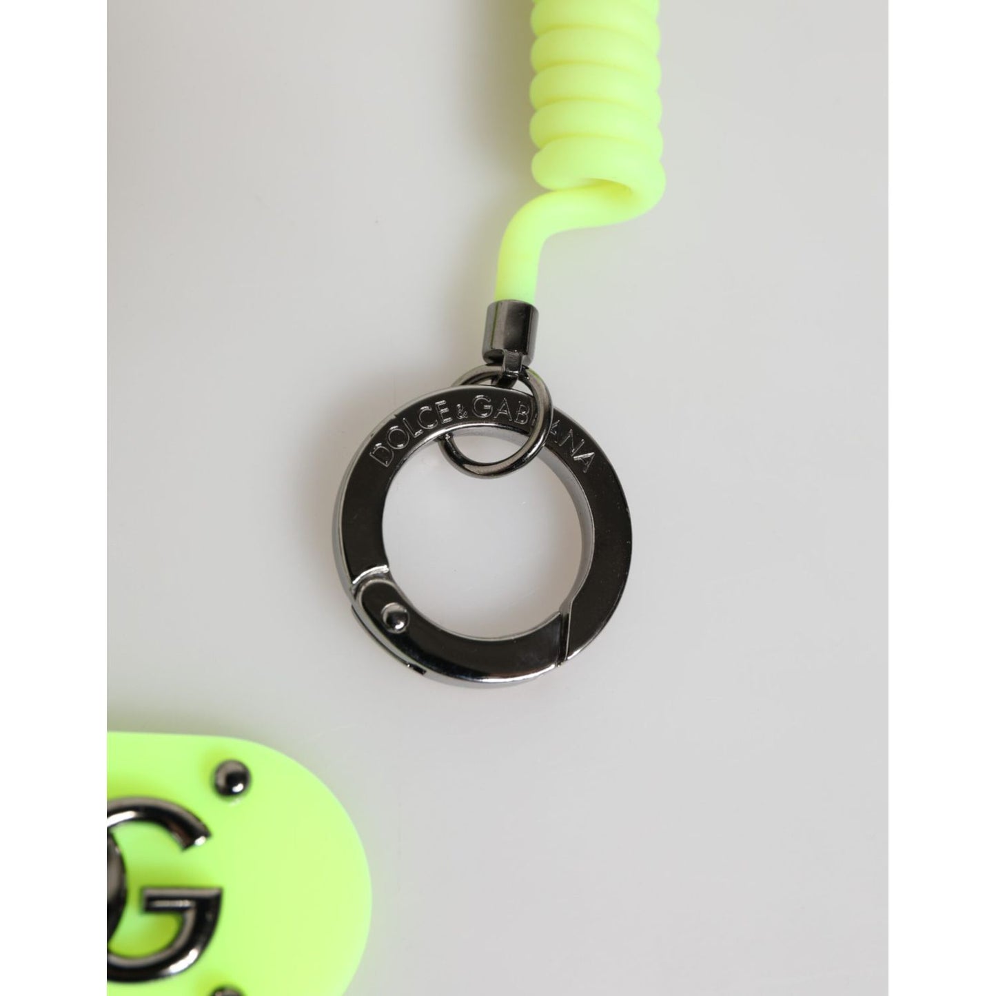 Dolce & Gabbana Green Springy Key Holder DG Logo Men's Keychain featuring green cord and metal ring close-up.