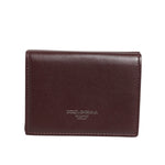 Dolce & Gabbana Leather Embossed Logo Trifold Men Card Holder Dark Brown, embossed with Milano logo, crafted in high-quality leather.