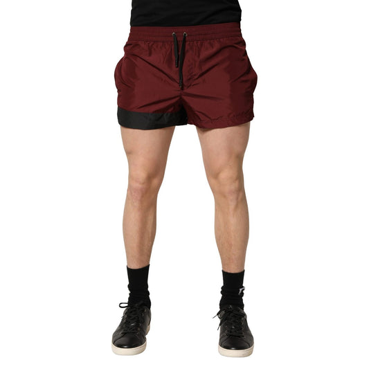 Dolce & Gabbana Maroon Polyester Drawstring Shorts Swimwear 1728,67345645728,Clothing,Dolce & Gabbana,IT4 | S,Maroon,Material: 100% Polyester,Men,New with tags,Swim Shorts - Swimwear - Clothing,Swimwear - Clothing