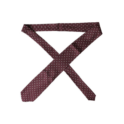 Dolce & Gabbana Maroon Silk Branded Logo Adjustable Men Tie on display with intricate design, 100% silk, elegant and sophisticated accessory.
